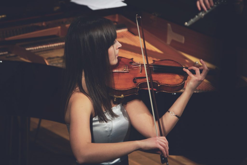 a girl practice violin